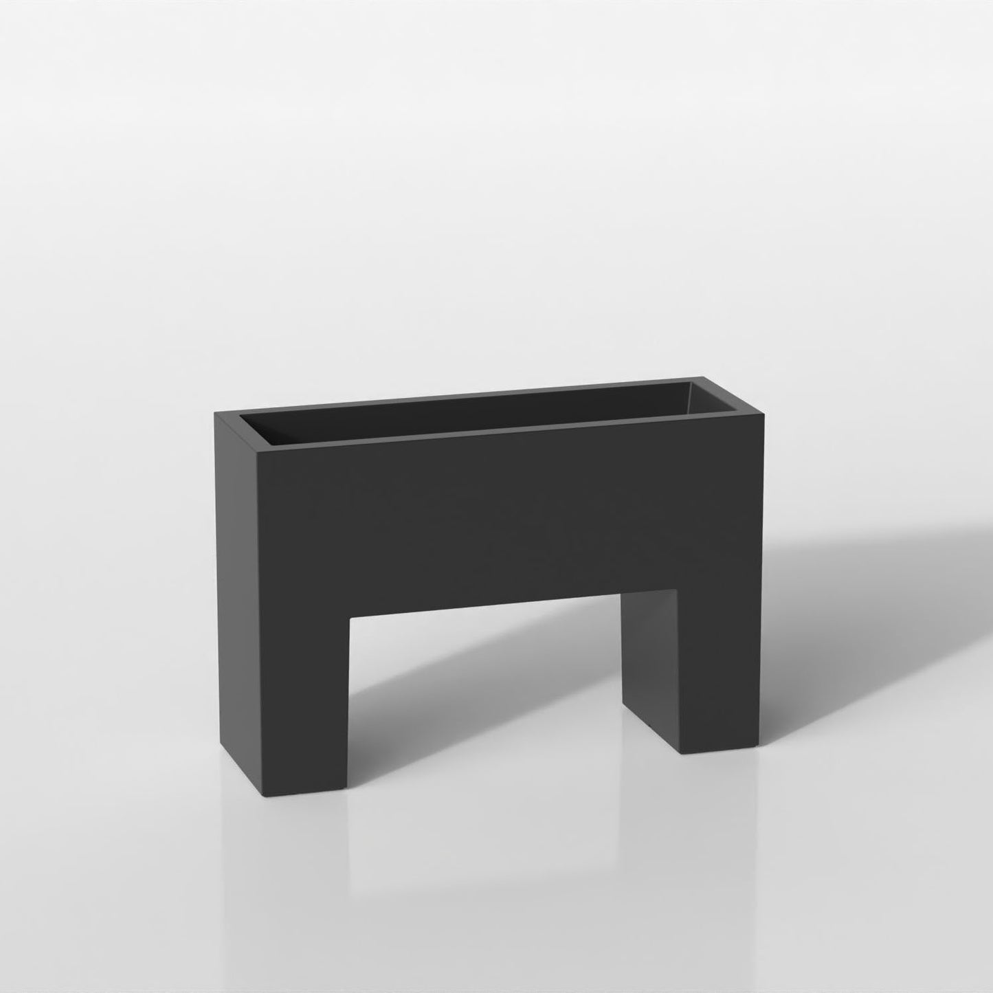 Macetero Jardinera de Exterior para decorar el jardín o la terraza. Diseñado por Studio Vondom. Macetero de diseño moderno fabricado en España. Resina de Polietileno de alta resistencia al exterior y al sol.