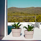 Macetero Grande Redondo  de Exterior para decorar el jardín o la terraza. Diseñado por Studio Vondom. Macetero de diseño moderno fabricado en España. Resina de Polietileno de alta resistencia al exterior y al sol.
